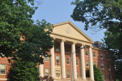 Exterior of a brick columned building