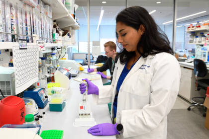 A researcher works in a lab